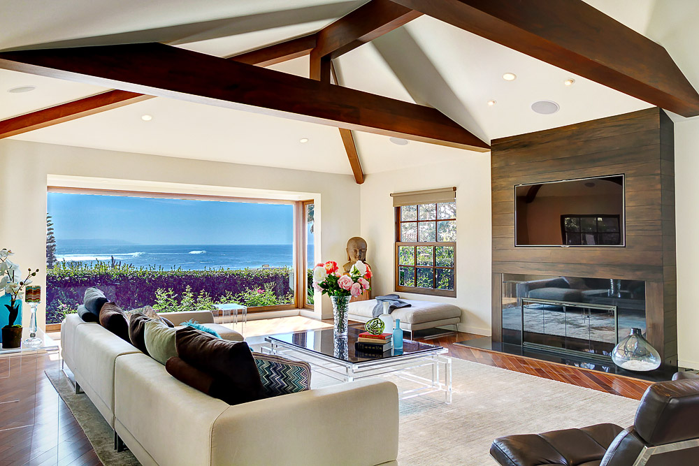 Image of main living space with waterfront view inside 6005 Camino de la Costa real estate