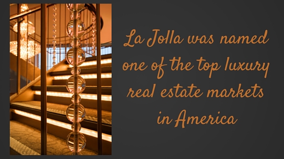 iron rod staircase in luxury home next to graphic that says La Jolla was named one of the tope real estate markets in America